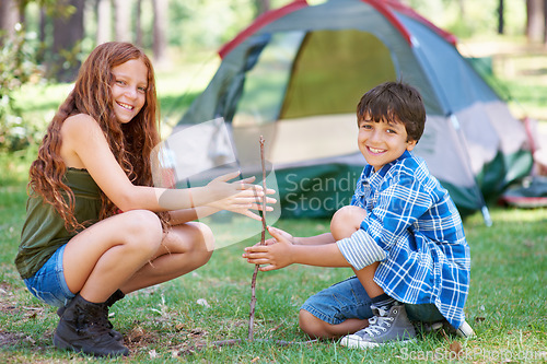 Image of Start, campfire or portrait of children in forest for summer camp, teamwork or learning together. Smile, spark or friends on adventure with sticks or happy kids in woods on holiday vacation in nature