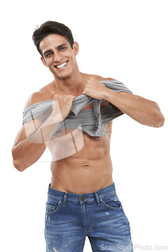 Image of Man, portrait and smiling or pride for fashion in studio, happy and style by white background. Male person, abs and strong core or muscular abdomen, confident and results or progress from fitness