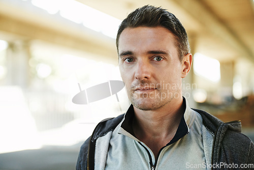 Image of Man, portrait and fitness in city street for running, exercise or outdoor training in fitness. Closeup of male person or athlete ready for workout, cardio or health and wellness in an urban town