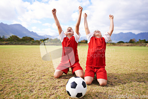 Image of Children, soccer team and cheering for success and celebration, happy and victory in outdoors. People, kids and excited for achievement, collaboration and partnership or teamwork on field or sports