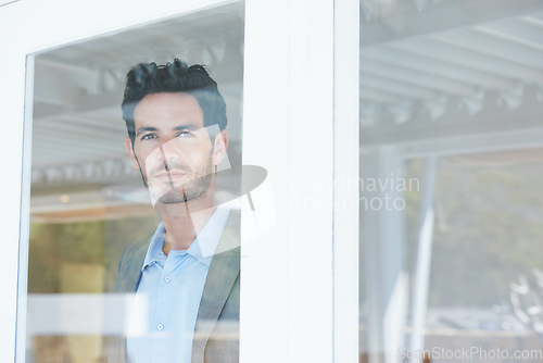 Image of Man, inspiration at window and thinking of business ideas, brainstorming or reflection with insight at workplace. Corporate professional, mission with decision and future in company with planning