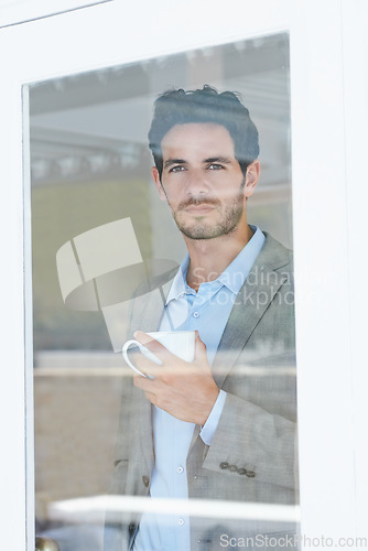 Image of Man, tea and window with thinking of business ideas, brainstorming or reflection with insight and inspiration. Corporate professional, coffee break with decision and future in company with planning