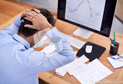 Image of Business man, trader with burnout and tired at work, stress about job and graphs on screen. Stock market crash, headache and pressure with crisis or disaster in trading with numbers or stats fail