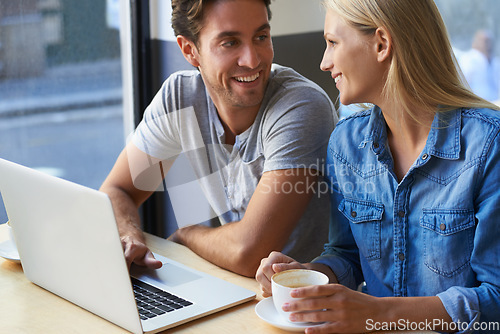 Image of Talking, laptop or happy couple in coffee shop or cafe on website for booking a holiday vacation. Love, man or woman on technology for online shopping, research or social media with tea cup or smile
