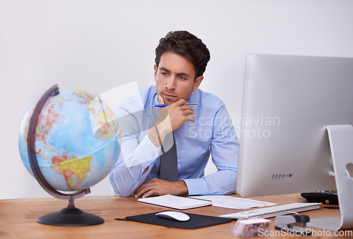 Image of Thinking, earth or businessman with travel ideas or worldwide destination choice in office. Writing notes, brainstorming or professional agent with map of planet for geography or international trip