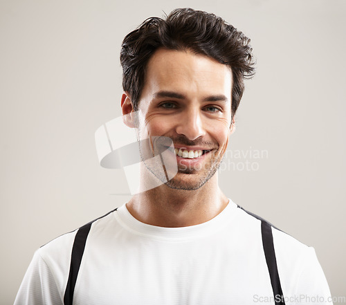 Image of Smile, portrait or athlete in studio for fitness workout, sports exercise or healthy wellness. Mockup space, grey background or happy man ready to start training with confidence, discipline or pride