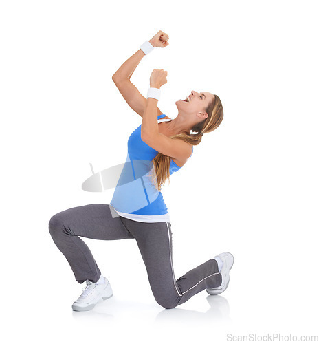 Image of Excited woman, fitness and fist pump in celebration for winning isolated on a white studio background. Female person or athlete smile in relief for prize, achievement or good news on mockup space