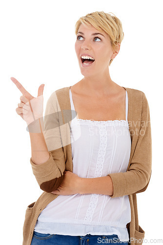 Image of Happy woman, pointing and surprise for choice, decision or pick on a white studio background. Female person, model or blonde smile with finger for alert, notification or thinking on mockup space