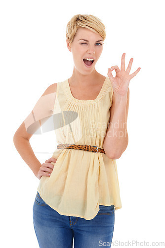Image of Happy woman, portrait and wink with okay sign for good job or perfect gesture on a white studio background. Female person, model or blonde smile with like emoji, yes or ok for approval or spot on