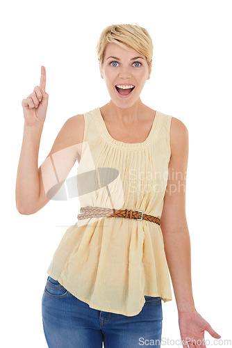 Image of Happy woman, pointing up and surprise for idea, solution or answer on a white studio background. Portrait of young female person, model or blonde smile with finger for question, choice or decision