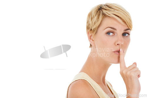 Image of Woman, secret and finger on lips for gossip or confidential information on a white studio background. Face of female person, model or blonde in silence for quiet, whisper or shush on mockup space