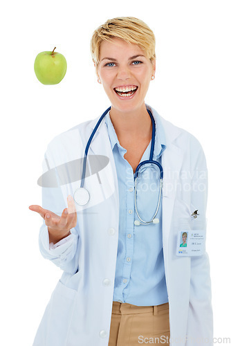 Image of Doctor, woman and apple, healthcare and diet with nutritionist in studio, happiness and wellness on white background. Healthy food promotion, medical professional with green fruit for nutrition