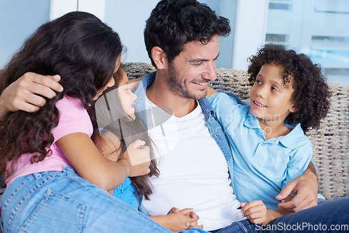 Image of Happy, hugging and father with children on sofa for bonding, love and care at family home. Smile, fun and young dad embracing and having fun with kids on couch of living room at modern house together