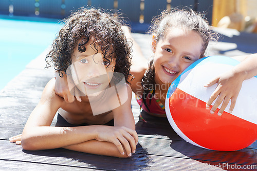 Image of Pool, smile and portrait of children with ball for swimming lesson, activity or hobby fun. Happy, summer and kids with equipment for skill, playing or tricks in water of outdoor backyard at home.