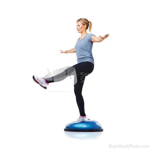 Image of Woman, bosu ball or leg balance in studio workout for development isolated on white background. Female athlete, training equipment or fitness for mockup space, body challenge or exercise for wellness