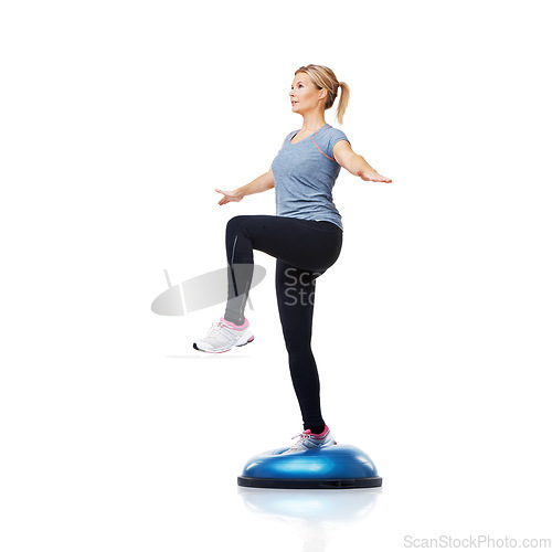 Image of Woman, bosu ball or leg balance in workout for development isolated on white background. Female athlete, training equipment or fitness for studio mockup space, body challenge or exercise for wellness