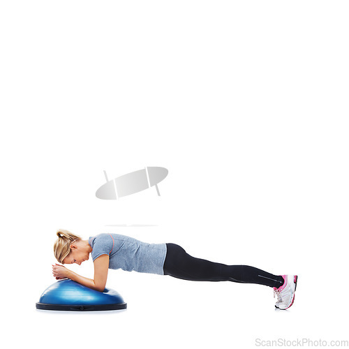 Image of Woman, fitness and half ball for plank in studio for training, strong exercise and gym with muscle health on floor. Person or young sports model in shoulder or arms workout on a white background