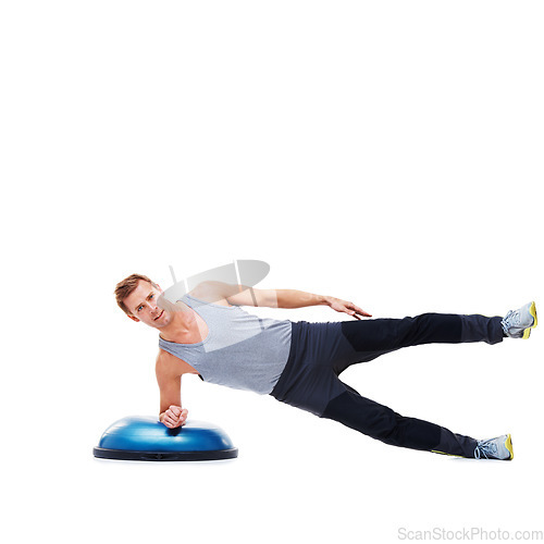 Image of Man, exercise and balance on bosu ball for core training, muscle and workout isolated on white background. Fitness equipment, strength and endurance with mockup space and strong athlete in studio