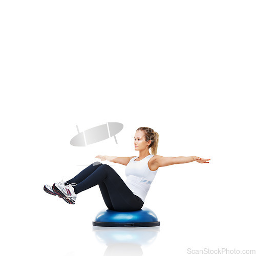 Image of Balance, exercise and woman with bosu ball in workout, core training and wellness on white background. Muscle, strength and power with challenge on mockup space, athlete and fitness tools in studio