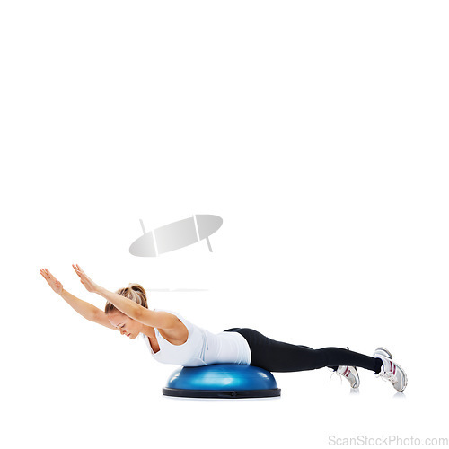 Image of Balance, fitness and woman with bosu ball in workout, core training and wellness on white background. Muscle, strength and power with challenge on mockup space, athlete and exercise tools in studio