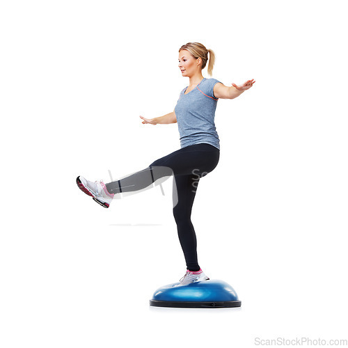 Image of Woman, legs and balance on bosu ball for exercise, workout or training on a white studio background. Active female person on half round object for pilates, practice or strong body on mockup space