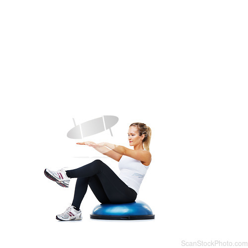 Image of Woman, bosu ball and sit ups for exercise, workout or fitness on a white studio background. Young active female person or athlete on half round object in pilates, health and wellness on mockup space