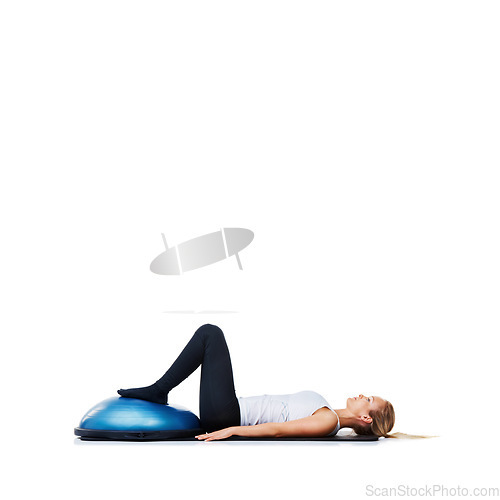 Image of Woman, bosu ball and sit ups for exercise, workout or fitness on a white studio background. Young active female person or athlete on half round object for yoga, health and wellness on mockup space