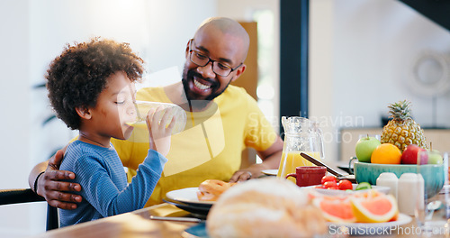 Image of Black family, juice and father with child for breakfast, lunch and eating together in home. Happy, parents and dad and boy at table for bonding with meal for health, nutrition and hunger in house