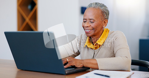 Image of Happy senior woman, laptop and typing in finance with documents for bills or expenses in remote work at home. Mature African female person or freelancer smile on computer in financial budget at house