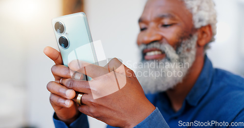 Image of Happy senior black man, phone and typing for communication, social media or networking at home. Face of mature African male person, smile and hands on mobile smartphone for online chatting or texting