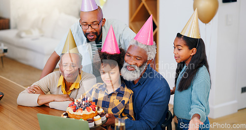 Image of Video call, laptop and family at birthday party celebration together at modern house with candles and cake. Smile, love and young children with African father and grandparents for dessert at home.