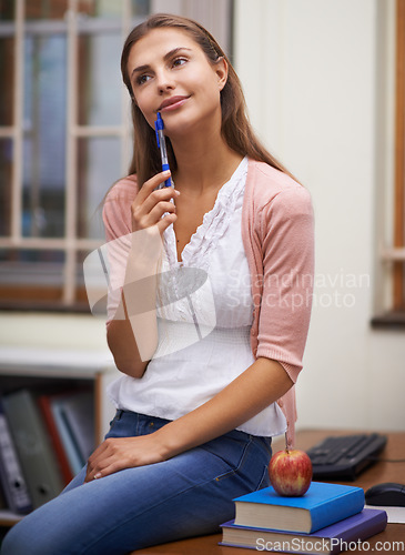 Image of School teacher, woman thinking and planning in classroom, brainstorming and ideas for education. Female person, knowledge and information for learning, contemplating academic and smiling for career