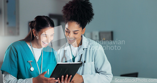 Image of Team of doctors, discussion and women on tablet in hospital for research, report advice and telehealth. Healthcare, clinic and people talking on digital tech for medical service, results and meeting