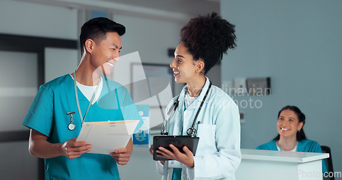 Image of Doctor, hospital and chart for discussion, colleague and tablet for consultation, medical data and cure. Healthcare, collaboration or work in clinic, man and woman with patient update, help or advice