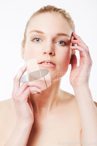 Image of Portrait of model, touching face or beauty for wellness with cosmetics, aesthetic or healthy glow. Facial dermatology, studio or confident woman with pride or skincare results on white background