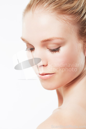 Image of Face of woman, shoulder or skincare for wellness with cosmetics, aesthetic or healthy glow. Facial dermatology, studio or confident model with pride or natural beauty results on white background