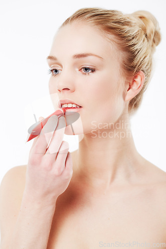 Image of Face, woman or red lipstick for makeup, skincare or beauty cosmetics in studio or white background. Transformation, ready or model with liner product for retouch, makeover or application on mouth