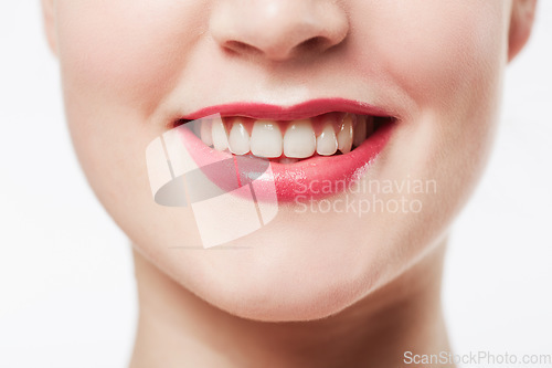 Image of Mouth, teeth and woman with red lipstick, cosmetics or dental for wellness with smile isolated on white background. Lips, makeup and beauty with veneers, oral health and cropped closeup in studio