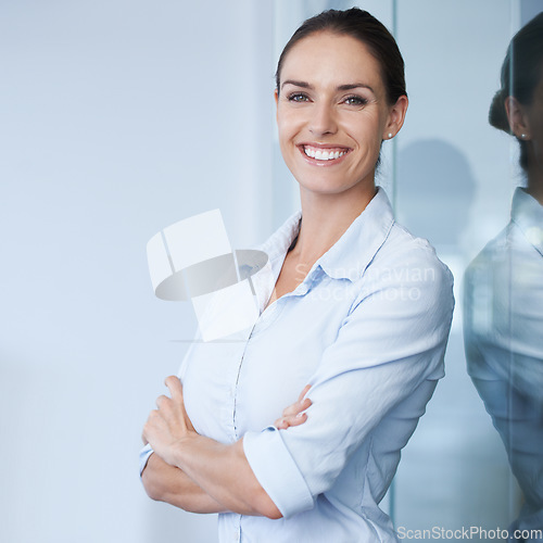 Image of Portrait of happy businesswoman with arms crossed, confidence or career at accounting agency. Financial advisor, professional female accountant or finance project manager at office with smile on face