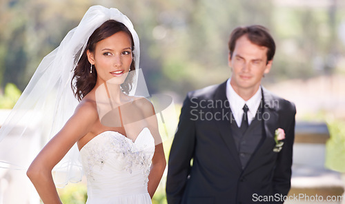 Image of Couple, happy and love on wedding day in outdoors, together and excited for marriage and commitment. People, romance and union at outside ceremony, loyalty and pride for fashion and partnership