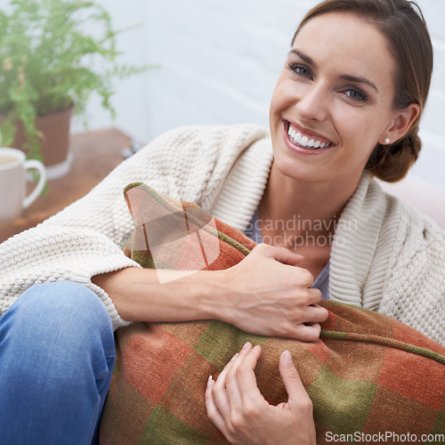 Image of Woman, portrait and happy on sofa with relax, confidence or comfortable in living room of apartment. Person, face and smile on couch of lounge with comfort, chilling or sitting for day off in home