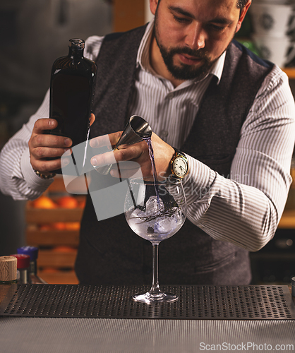 Image of Bartender preparing cocktail