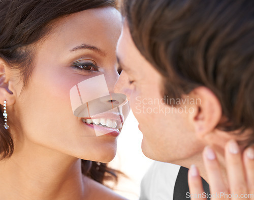 Image of Couple, romance and devotion on wedding day for marriage, closeup and love celebration at ceremony. People, zoom and commitment to happiness at event, union and loyalty or faithful to relationship