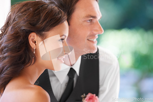 Image of Couple, partnership and together on wedding day at outdoor ceremony, smile and happy for marriage. People, profile and commitment to relationship and loyalty, love and union or side view of newlyweds