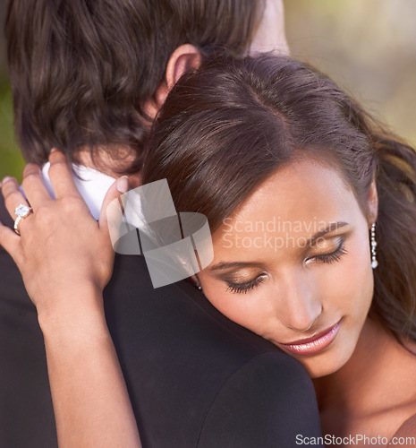 Image of Couple, unity and embrace on wedding day for love, support and together for marriage and commitment. People, romance and hugging at outdoor ceremony, loyalty and ring for devotion and partnership