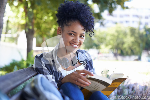 Image of Woman, student and portrait for book reading on university bench for study, education or learning. Female person, face and smile at college campus or outdoor for knowledge, scholarship or research