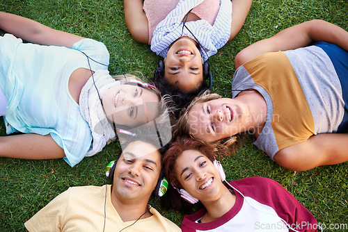 Image of Headphones, portrait or friends in park at college, campus or together with community, smile or group. University, above or happy people bond with support, joy or radio music in education in garden