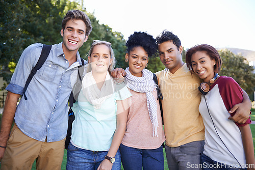 Image of Hug, portrait or students in park at college, campus or together with community, smile or group. University, diversity or happy people bond with support, joy or solidarity in education in garden