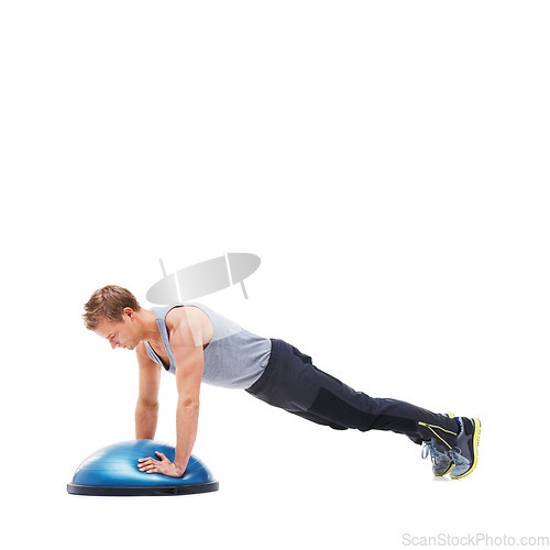 Image of Man, half ball and push up or training in studio, core strength and workout challenge for wellness. Male person, athlete and equipment for exercise, mockup space and performance by white background