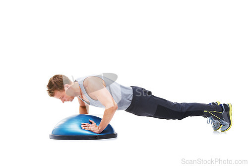 Image of Man, half ball and push up or fitness in studio, core strength and workout challenge for wellness. Male person, athlete and equipment for training, mockup space and performance by white background
